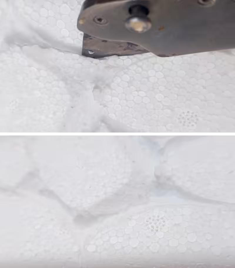 Close ups of a craft knife cutting pebble shapes in a cooler box